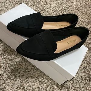 Black pointy flats
